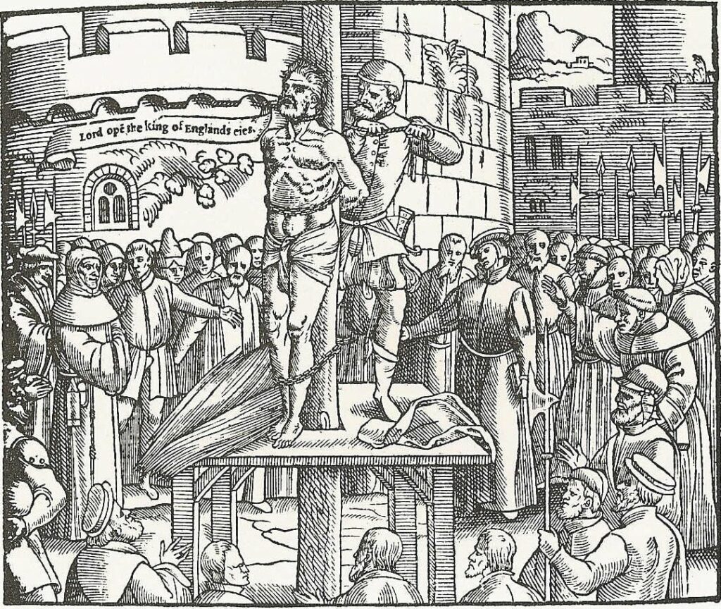 black and white drawing of William Tyndale standing on a platform being executed by strangulation